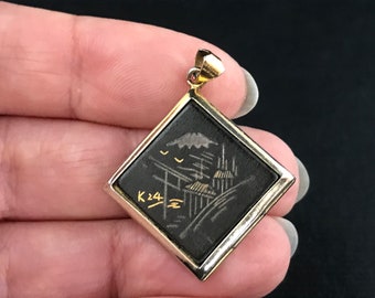 Vintage mid century Japanese Shakudo style Damascene black 24K gold and silver goldtone metal locket, costume jewellery