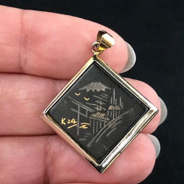 Vintage mid century Japanese Shakudo style Damascene black 24K gold and silver goldtone metal locket, costume jewellery