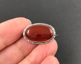 Dainty antique 1920s sterling silver carnelian gemstone oval brooch