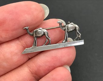 Dainty vintage Stanetzky sterling silver camel train brooch
