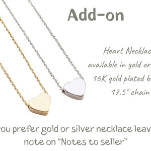 May include: Two heart necklaces, one gold and one silver, on a white background. The necklaces are 17.5 inches long and made of 16K gold plated brass. The text "Add-on" is at the top of the image. The text "Heart Necklace available in gold or silver 16K gold plated brass 17.5" chain If you prefer gold or silver necklace leave a note on "Notes to seller" is at the bottom of the image.