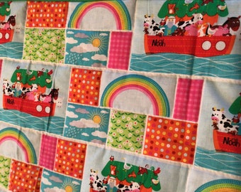 Brightly colored Noah’s ark hand quilted baby quilt-Bible Story-measures  43x36.5 inches- pieced quilt-