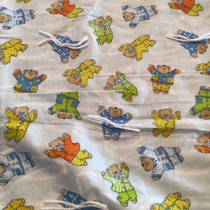 Tied teddy bear baby comforter- measures 42x 37 inches- fleece backing and binding