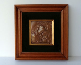 the picture with a wooden frame with an image of the Madonna and the Child Jesus, The inside is lined with green velvet, Italy in the 80s