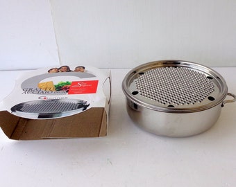 Italian round steel cheese grater box for Parmesan cheese. Cheese holder bowl with grater lid, once quality of the past,never used