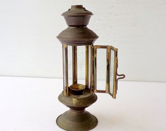 candle lantern, with opening and decorated display case, The structure is in metal, vintage 1940s ,Height 19 cm, diameter 7 cm