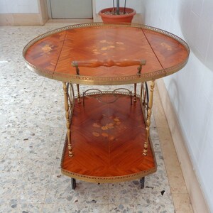 vintage wooden liquor trolley in pure Sorrento style with brass structure made in Italy from the 60s Height 73cm closed width43.5cm open70cm