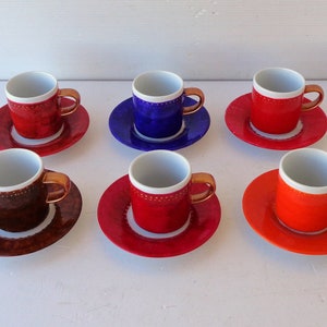 set of 6 cups and 6 saucers for coffee, in porcelain, with decorations of different colors, with golden handle