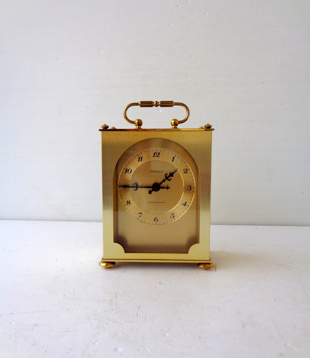 Kienzle Alarm Clock, Batterypowered Movement, in Brass, Height 15.5