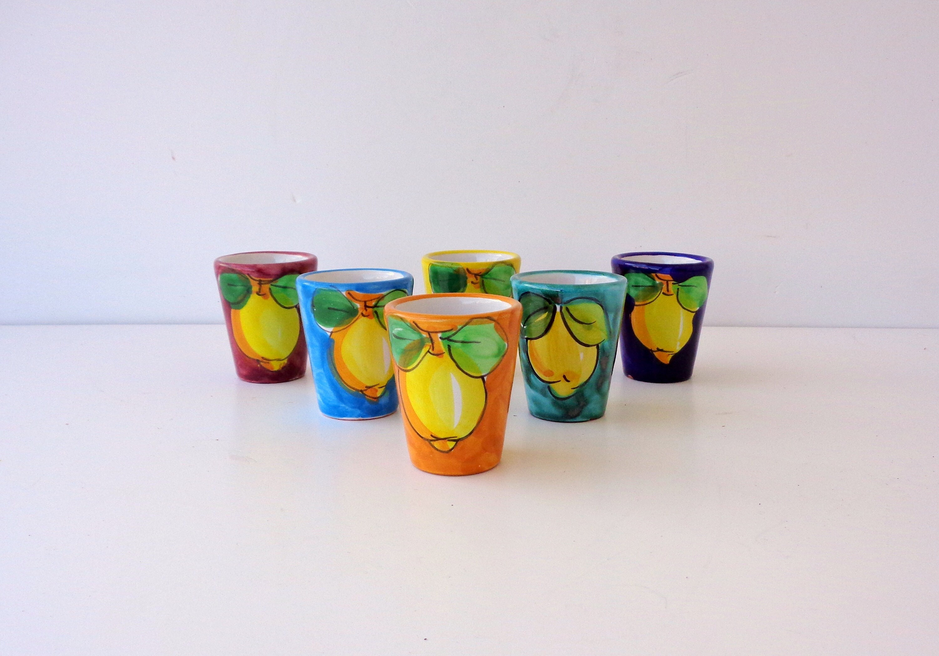 Limoncello 100% natural with ceramic glasses of Vietri sul Mare,  hand-painted