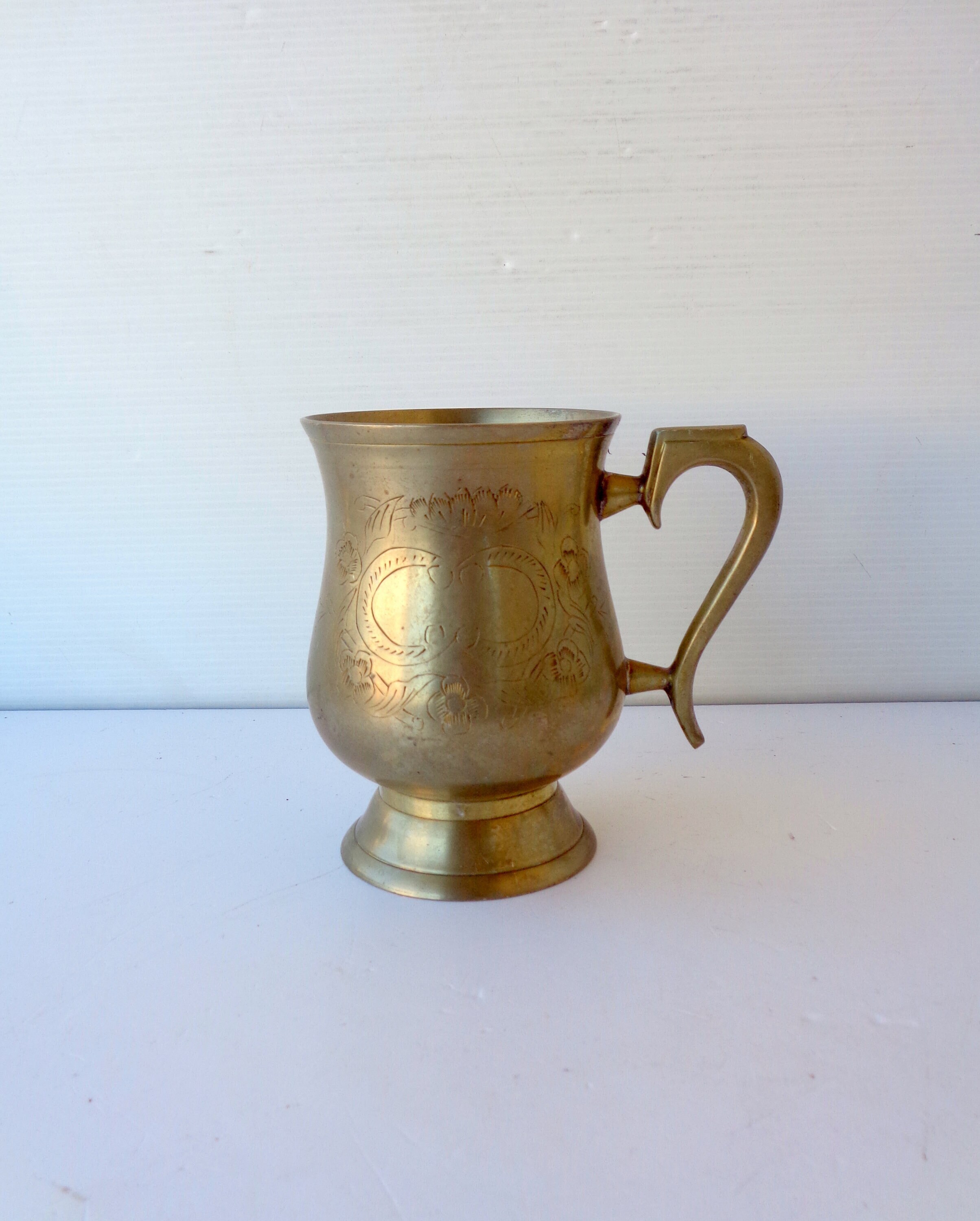 Antique full metal mug with chiseled decoration height 12.3 cm