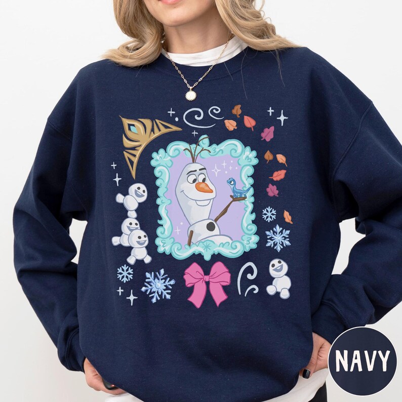 A navy blue sweatshirt with a colorful graphic design featuring characters from the Disney movie Frozen.