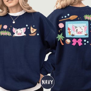 Navy sweatshirt with a cartoon pig design and various colorful elements on the back.