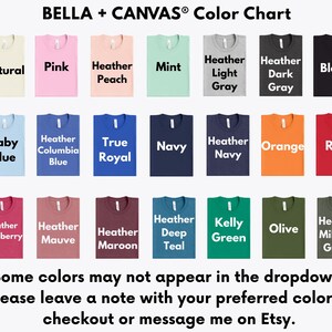 The image is a color chart featuring various t-shirt colors, including natural, pink, peach, mint, light gray, dark gray, black, baby blue, true royal, navy, orange, red, Heather raspberry, Heather maroon, Heather teal, Heather deep, Kelly green, olive, and Heather military.