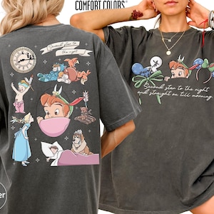 May include: Pepper-colored Comfort Colors t-shirt featuring Peter Pan and other characters. The front has a graphic with Peter Pan ears and the text "Second star to the night and straight on till morning." The back has various character illustrations.