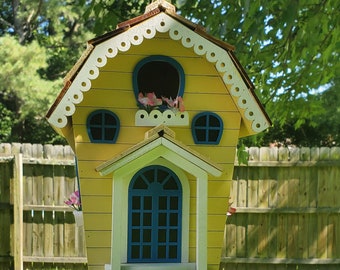 Home Bazaar 8in Indoor or Outdoor Storybook Birdhouse. This charming cottage decorative outdoor bird house is great for housing small birds.