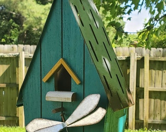 Teal Wood Birdhouse with Dragonfly and metal in construction.  This birdhouse will brighten any space whether indoors or outdoors.