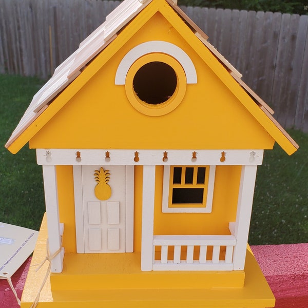 Home Bazaar 8x9 Indoor or Outdoor Pineapple Birdhouse that give the backyard birds a place to nest, adding a decorative touch to any area.