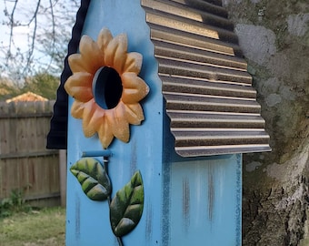 Blue Wooden Birdhouse Metal Roof, Orange Flower around the Opening, Home Decoration, Indoor Bird House, Decorative, Metal Accent.