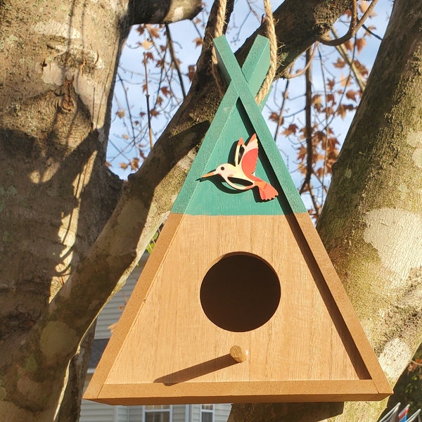 10" Turquoise Birdhouse Tabletop Tent Birdhouse.  This bird house is the inviting home that your new feathered friend will be able to enjoy.