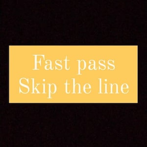 May include: A yellow rectangle with the text "Fast pass Skip the line" in white.