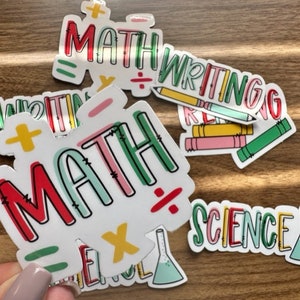 May include: Colorful stickers with the words "Math", "Writing", and "Science" in a playful font. Each sticker features a different symbol, such as a plus sign, an equal sign, or a division sign. The stickers are perfect for adding a touch of fun to school supplies or notebooks.