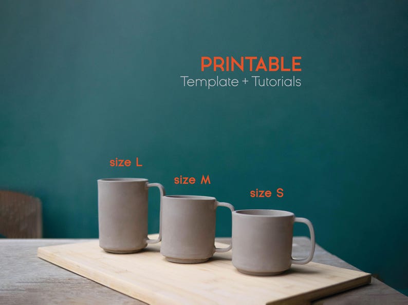 May include: Three beige ceramic mugs of varying sizes (L, M, S) with handles are displayed on a wooden board. The mugs are cylindrical and have a minimalist design. The text "PRINTABLE Template + Tutorials" is in orange above the mugs.