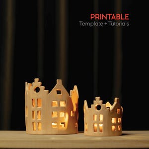 May include: Two light-coloured, house-shaped candle holders with cut-out windows and doors, illuminated from within. The text PRINTABLE Template + Tutorials is visible at the top. The structures feature stepped gables and circular openings.
