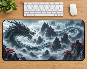 May include: A rectangular desk mat featuring a large, detailed gray dragon with red eyes winding through misty, jagged mountain peaks. The scene includes waterfalls, small pagodas perched on cliffs, and vibrant red-leafed trees amidst thick white clouds.