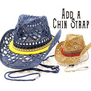 May include: Two crocheted cowboy hats, one blue with a yellow band and one tan with a red band. The text "ADD A CHIN STRAP" is written in black above the hats.