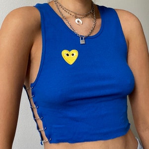 handmade blue top with chains and safety pins and yellow heart patch