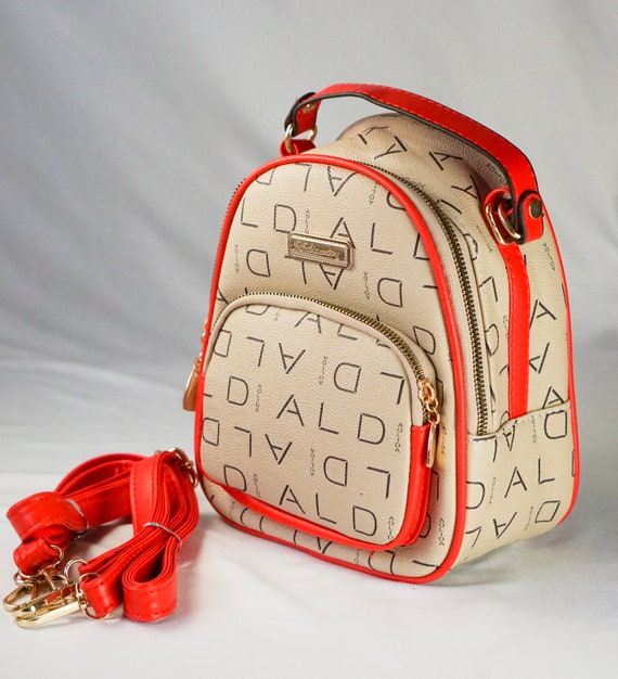 red designer backpack