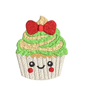 May include: An embroidered cupcake design featuring a beige base, green and beige swirled frosting, and a bright red bow on top. The cupcake has a white pleated wrapper with a smiling face, black circular eyes, and small red circular cheeks.