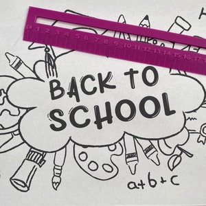 May include: A black and white illustration of school supplies, including a globe, a paint palette, a ruler, musical notes, and a graduation cap. The illustration is surrounded by a cloud with the text "BACK TO SCHOOL" in black.