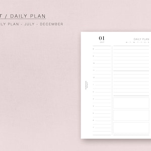 May include: A black and white daily planner with the text "POCKET / DAILY PLAN" and "DATED DAILY PLAN - JULY - DECEMBER". The planner has a date of "01 JULY" and a section for "DAILY PLAN" with the days of the week abbreviated.