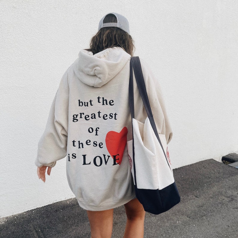 the greatest of these is love hoodie sand black brown ash light puff-print image 1