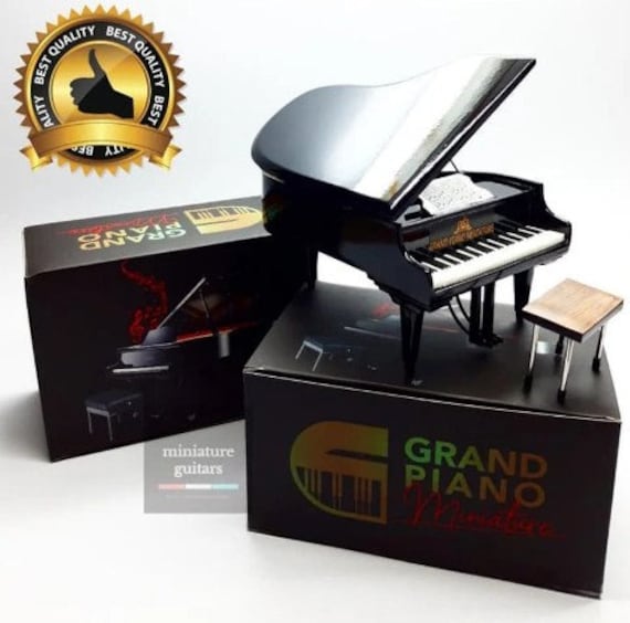 Strumento musicale in miniatura modello pianoforte in legno