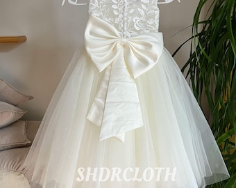 Abito da damigella in tulle e pizzo color avorio chiaro scintillante: abito da compleanno effetto illusione con grande fiocco a coda.