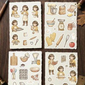 May include: Four sheets of stickers with baking illustrations. The stickers depict a baker, kitchen tools, and ingredients. The text "WILLOW THE BAKER" is at the top. The colour scheme is soft and warm, with a vintage aesthetic.