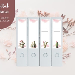 May include: Four printable binder spine labels featuring watercolour cactus illustrations with pink accents. The labels have lines for writing and say "Digital Download Zum Selbst Ausdrucken".