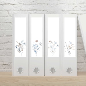 May include: Set of five white file folders with floral designs. Each folder features a different watercolour floral design in shades of blue, brown, and pink.