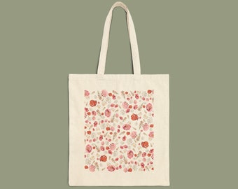 Borsa tote in tela di cotone rosa con motivi floreali