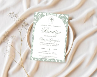 May include: A baptism invitation card with a light green floral design and the text "ACOMPAÑANOS A CELEBRAR EL Bautizo DE NUESTRO HIJO Thiago Gonzales". The card includes the date, time, and location details. The invitation is on a white plate.
