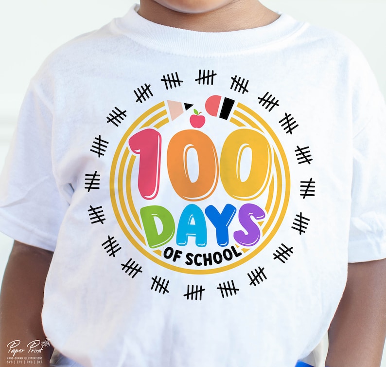 May include: White t-shirt with a colorful graphic that says "100 Days of School". The graphic is surrounded by a circle of black hash marks.