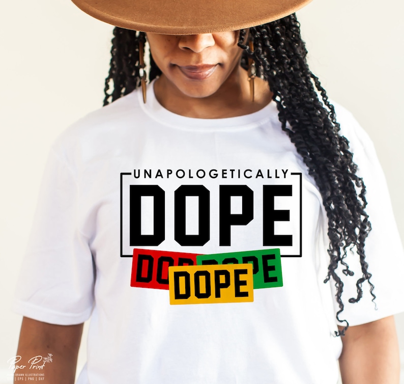 May include: White t-shirt with the text "Unapologetically Dope" in black lettering. The word "Dope" is repeated three times in smaller boxes with red, green, and yellow backgrounds.