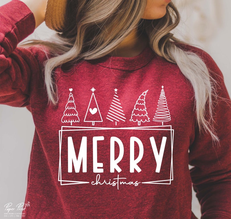 May include: Red sweatshirt with a white design of five stylized Christmas trees and the text "Merry Christmas".