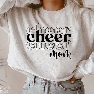 May include: A grey sweatshirt with the text "cheer cheer mom" in black.