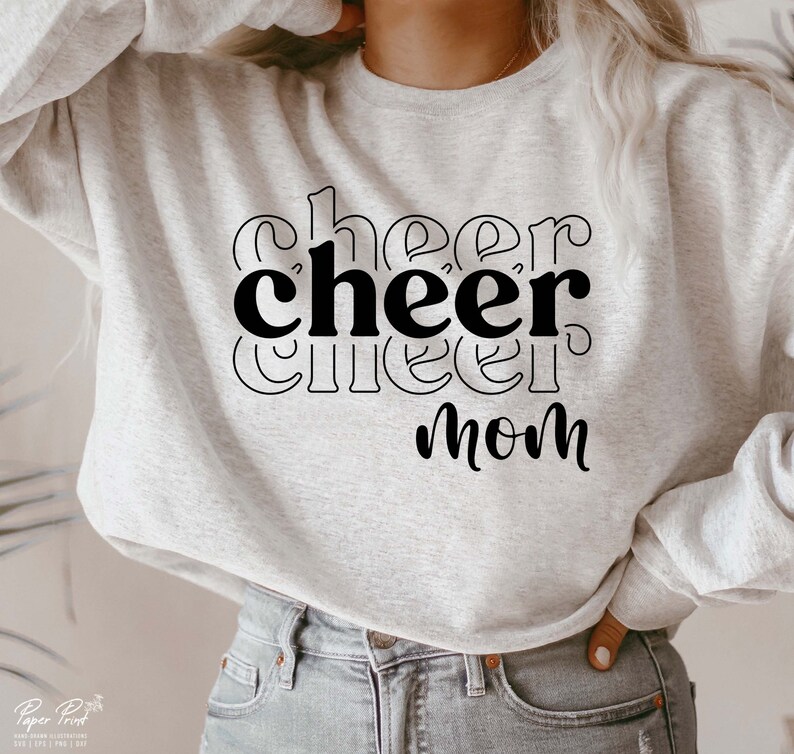 May include: A grey sweatshirt with the text "cheer cheer mom" in black.