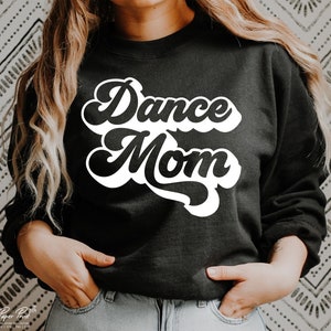 Peut inclure: Sweat-shirt noir avec inscription blanche de style r&eacute;tro "Dance Mom".