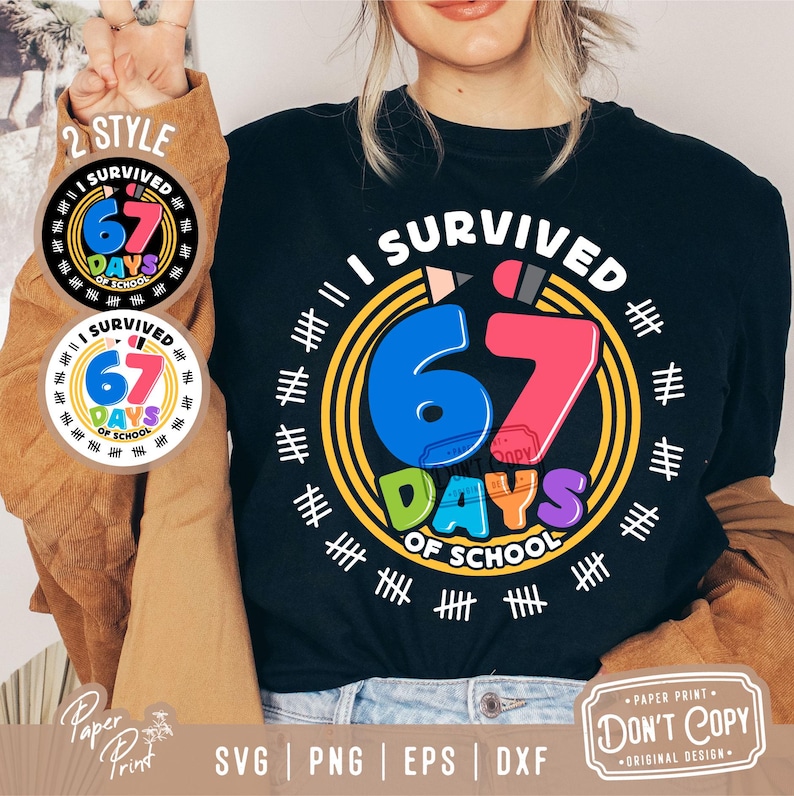 May include: Black t-shirt with the text "I SURVIVED 67 DAYS OF SCHOOL" in a colorful design. The number 67 is in blue and pink, surrounded by a yellow circle and tally marks. Two circular stickers with the same design are also visible.